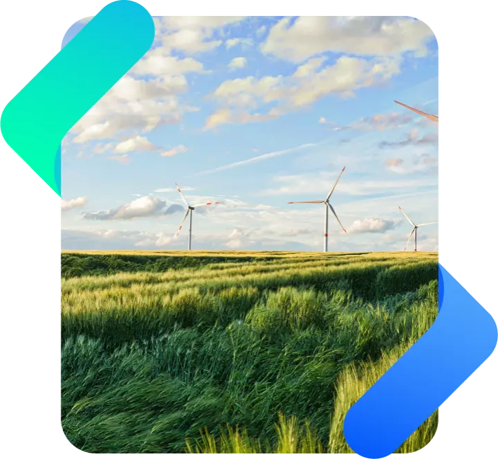 green field with renewable energy generation pinwheels